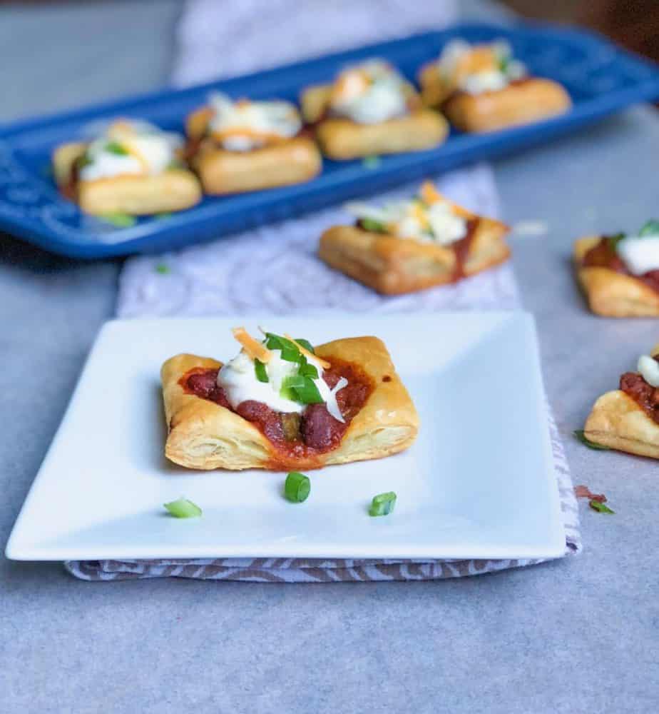 puff pastry canapes with chili and sour cream and chives