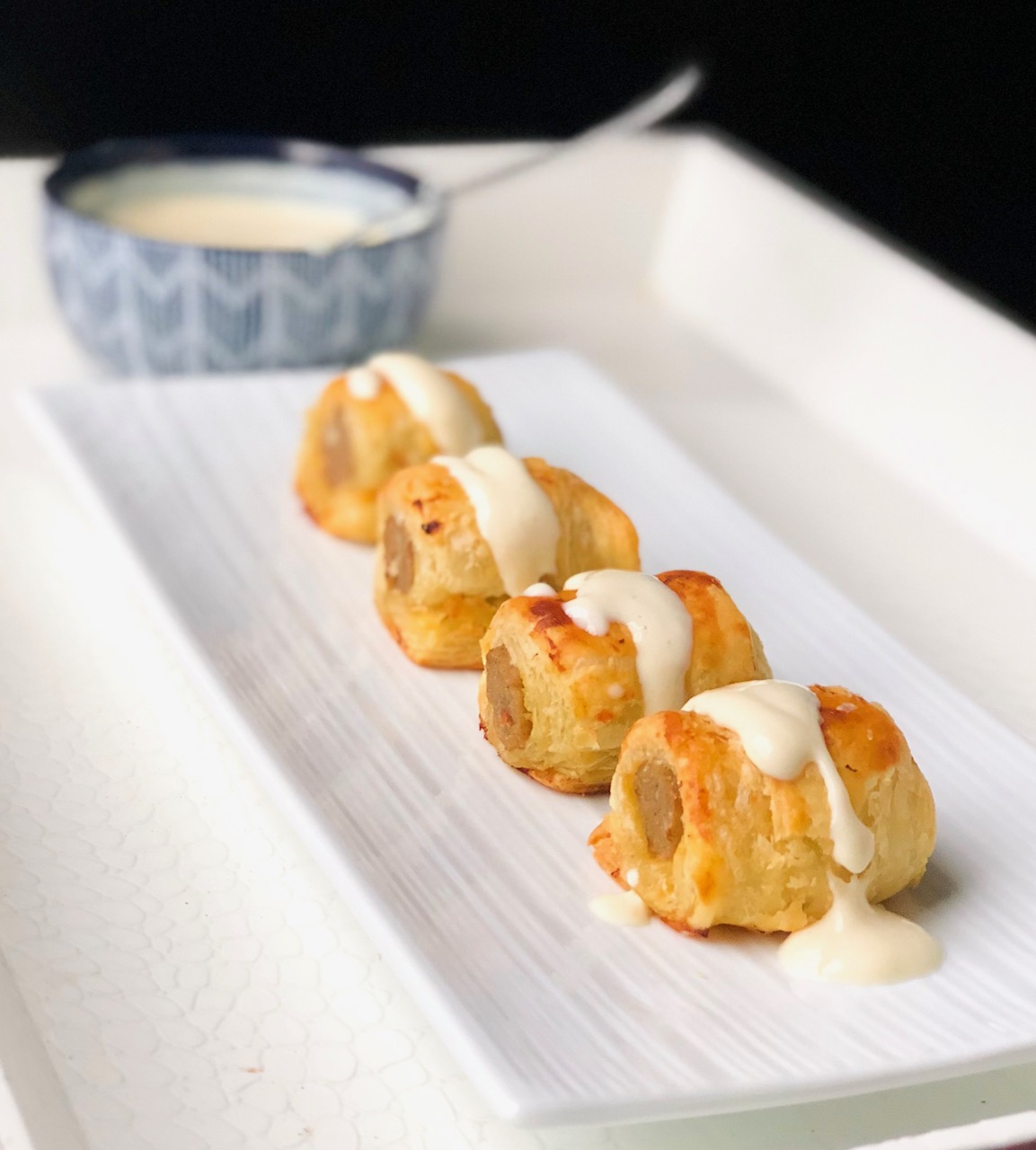 Puff Pastry Sausages Bites with Creamy Dijon Sauce