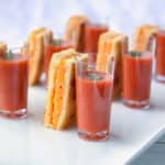 How to make a simple appetizer that serves a crowd! These grown up grilled cheese sticks are baked and can be made ahead of time! A cheap make ahead finger food perfect for adults or kids! #weddingfood #horsd'oeuvres #fancyappetizers #cocktailhour