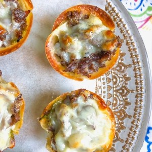 Crispy Philly Cheesesteak Appetizer Cups with simple cheese sauce