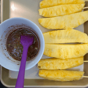 Pineapple wedges with jalapeno honey cinnamon marinade glaze
