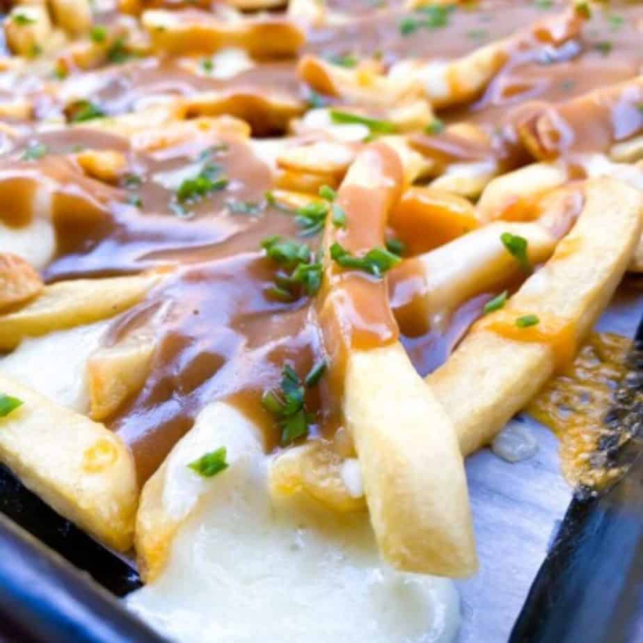 gravy fries on a baking sheet
