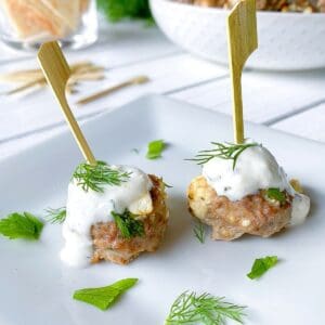 lamb meatballs with feta cheese on skewers